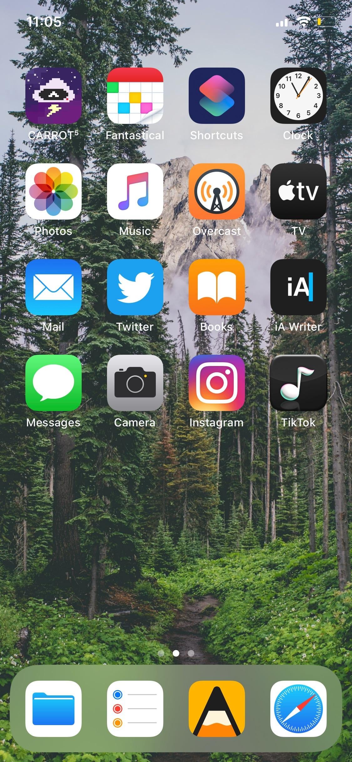 Social media apps populate a mobile device screen as TikTok announces major branding changes.