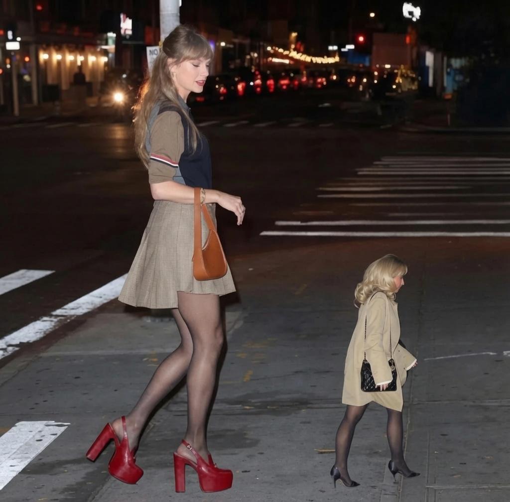 Taylor Swift seen walking in the city where her height has become a topic of national discussion.