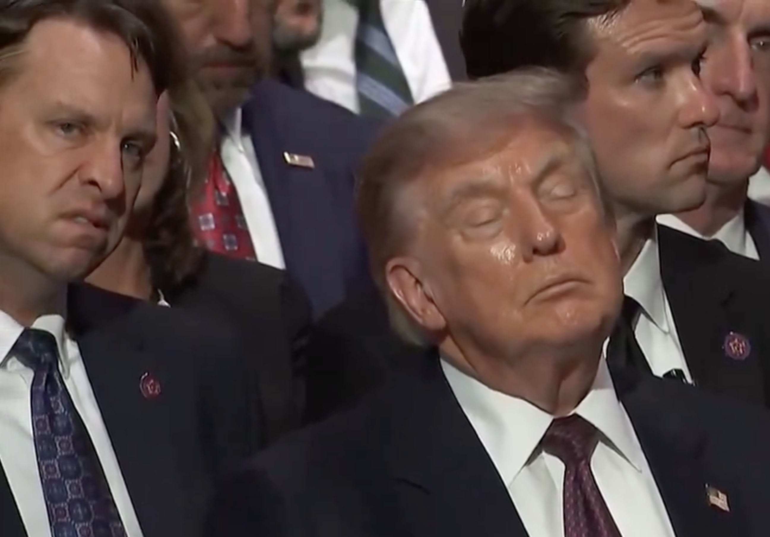 Former President Donald Trump is seen with his eyes closed during a recent event.