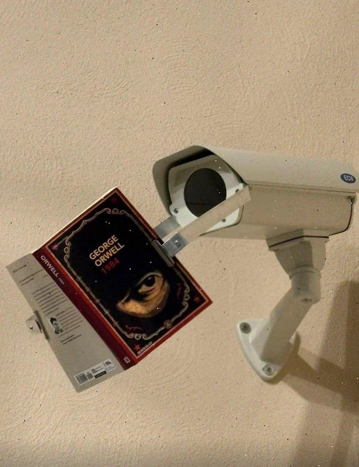 A security camera in the Kanawha Valley is calibrated using a copy of 1984 by George Orwell.